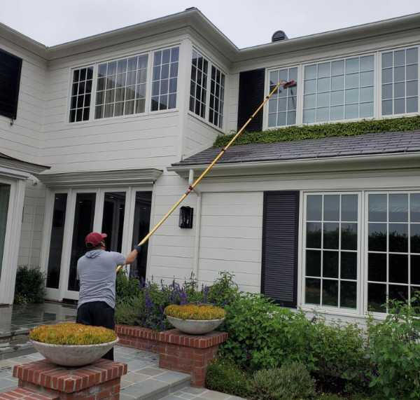 Window Cleaning Service by Impressions Commercial Maintenance